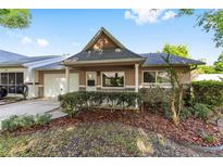 Charming one story townhome with a well maintained lawn, attached garage and pleasant curb appeal at 9320 Sw 89Th Ter # C, Ocala, FL 34481