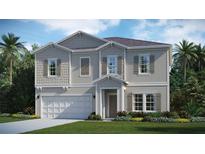 Charming two-story home boasts a landscaped yard, two-car garage, and welcoming entrance at 3211 Ne 40Th Ln, Ocala, FL 34479