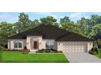 Beige single-Gathering home featuring an attached two-car garage, manicured landscaping, and an inviting front entry at 8483 Sw 59Th Ter, Ocala, FL 34476
