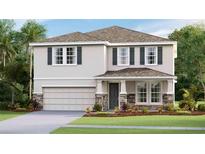 Charming two-story home with stone accents, a covered porch, symmetrical window placement, and well-maintained landscaping at 4180 Sw 53Rd Lane Rd, Ocala, FL 34474