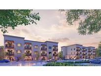 New multi-Gathering construction shows modern design with balconies in evening light at 415 Se 1St Ave # 101-B, Ocala, FL 34471