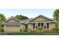 Charming single-story home featuring a two-car garage, well-maintained lawn and professionaly landscaped front yard at 357 Hickory Course Trl, Ocala, FL 34472