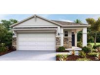 Charming single-story home showcasing a neutral color palette, stone accents, and well-maintained landscaping at 8582 Pinecrest Trl, Wildwood, FL 34785
