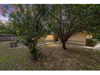 Charming single-story home featuring mature trees and a well-maintained front yard at 11447 Sw 128Th Ave, Dunnellon, FL 34432