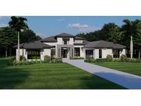 Elegant single-story home with modern architectural details, professional landscaping, and a spacious driveway at 0000 Se 116Th Place Rd, Ocala, FL 34480