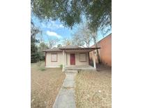 Charming single-story home featuring a cozy covered porch at 421 Sw 3Rd St, Ocala, FL 34471