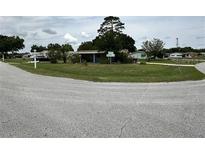 An exterior street view of a cozy home in a charming neighborhood at 8901 Sw 103Rd Ln, Ocala, FL 34481