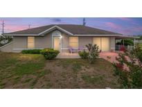 Charming single-story home with a well-maintained lawn and inviting front entrance at 21 Pine Trace Run, Ocala, FL 34472