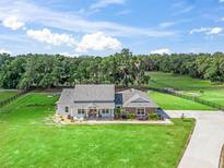 Stunning property featuring lush green lawns and picturesque views at 5330 Ne 111Th Lane Rd, Anthony, FL 32617