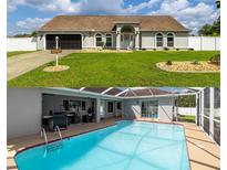 Inviting backyard pool area perfect for relaxing and entertaining outdoors at 2671 Sw 158Th Lane Rd, Ocala, FL 34473