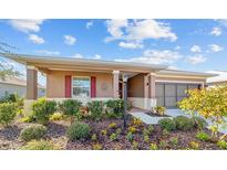 Charming single-story home with landscaped front yard and covered porch at 10584 Sw 91St Street Rd, Ocala, FL 34481