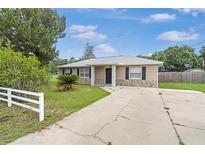 Charming single-story home with a well-maintained front yard, stone accents, and a cozy entrance at 4250 Nw 26Th Ter, Ocala, FL 34475