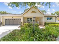 Charming single-story home with a well-maintained lawn and welcoming front porch at 9085 Sw 96Th Ln # B, Ocala, FL 34481