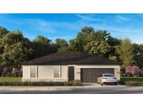 Charming one-story home with a two-car garage, stone accents, and professional landscaping at 6859 Sw 128Th Pl, Ocala, FL 34473
