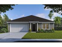 Charming single-story home boasts a well-manicured lawn, attached two-car garage, and stylish front entry at 6865 Sw 153 Place Rd, Ocala, FL 34473