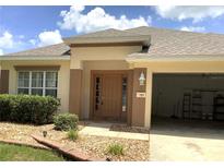 Charming single-story home with a well-maintained front yard and inviting front entrance at 3983 Sw 51St Ct, Ocala, FL 34474