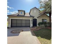 Charming single-Gathering home with a well-manicured lawn, two car garage, and beautiful landscaping at 9395 Sw 70Th Loop, Ocala, FL 34481