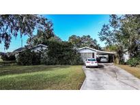 Ranch-style home with carport and spacious yard at 1329 Mount Pisgah Rd, Fort Meade, FL 33841