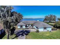 Stunning waterfront home with a large backyard and private dock at 3340 Crump Rd, Winter Haven, FL 33881