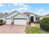 Attractive single-story house with two-car garage and landscaped yard at 3946 Bedford Ave, Winter Haven, FL 33884