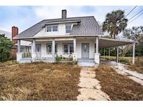 Charming two-story house with a covered porch at 520 S 10Th St, Lake Wales, FL 33853