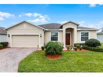 Charming single-story home featuring a well-maintained lawn and inviting curb appeal at 4009 Bedford Ave, Winter Haven, FL 33884