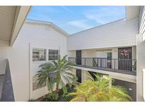 Apartment complex exterior with palm trees and multiple units at 1550 11Th Ne St # G6, Winter Haven, FL 33881