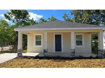 Charming single-story home with a covered porch and stone accents under the columns at 612 Sears Ne Ave, Winter Haven, FL 33881