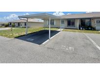 Charming condo with dedicated covered parking space, and well-maintained landscaping at 615 Ridge Ter # 615, Winter Haven, FL 33881