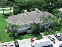 Beautiful apartment building with lush landscaping and ample parking at 1102 Eagle Pond Dr # 1102, Winter Haven, FL 33884
