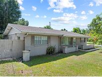 Charming brick home with well-maintained lawn and landscaping at 2800 Sunset Nw Dr, Winter Haven, FL 33881