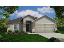 Charming single-story home featuring stone accents, a well-manicured lawn, and an inviting front entrance at 378 Harper Estates Cir, Lake Wales, FL 33859