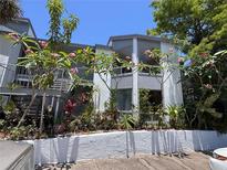 Attractive condo building surrounded by lush tropical landscaping, a serene and inviting complex at 4318 Aqua Vista Dr # K, Orlando, FL 32839