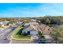 Aerial view of house and neighborhood at 1201 Winding Willow Ct, Kissimmee, FL 34746