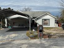 Single-story house with carport and mailbox at 1370 Fern Ln, Daytona Beach, FL 32117