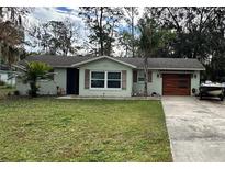 Charming ranch home with updated exterior and landscaping at 14636 Bray Rd, Orlando, FL 32832