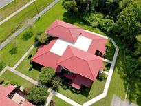 Aerial view of a red-roofed townhouse community at 540 Hunter Cir, Kissimmee, FL 34758
