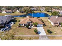 Single-Gathering home with pool and lake view in a quiet residential neighborhood at 644 Adriane Park Cir, Kissimmee, FL 34744