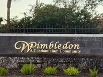 Wimbleton: A condominium community sign with dark brick and neat landscaping at 3240 S Semoran Blvd # 14, Orlando, FL 32822