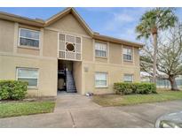 Charming condo featuring a neutral color scheme and a well-maintained exterior at 2416 Swailes Dr # 8, Orlando, FL 32837