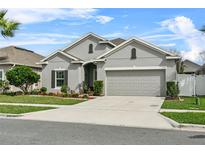 Beautiful single Gathering home with a well manicured yard and two car garage at 2559 Eagle Bay Blvd, Kissimmee, FL 34743