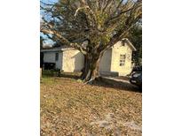 Cozy home exterior with mature tree coverage offering ample shade at 10538 Clarcona Ocoee Rd, Apopka, FL 32703