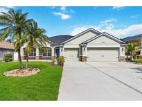 Charming single-story home featuring a well-manicured lawn and a two-car garage at 784 Seneca Trl, St Cloud, FL 34772