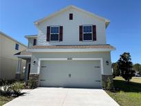 Charming two-story home with a two-car garage and stone accents for added curb appeal at 3600 Sagefield Dr, Harmony, FL 34773