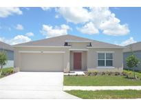 Charming single-story home with manicured lawn and neutral-colored exterior at 4881 Vellacito Way, Davenport, FL 33897