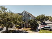 Attractive condominium featuring well-kept landscaping, a welcoming entrance, and convenient parking at 9061 Lee Vista Blvd # 1303, Orlando, FL 32829