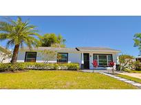 Charming home featuring mature landscaping and a freshly painted exterior at 1215 Little Spring Hill Dr, Ocoee, FL 34761