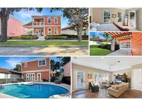 Inviting two-story home featuring a charming front porch and manicured landscaping at 7422 Sparkling Ct, Reunion, FL 34747