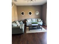 Inviting living room featuring comfortable seating and decor at 8981 Shine Dr, Kissimmee, FL 34747