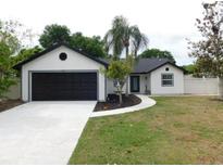 Charming one-story home with a well-manicured lawn and freshly painted exterior at 527 Stillwater Dr, Oviedo, FL 32765